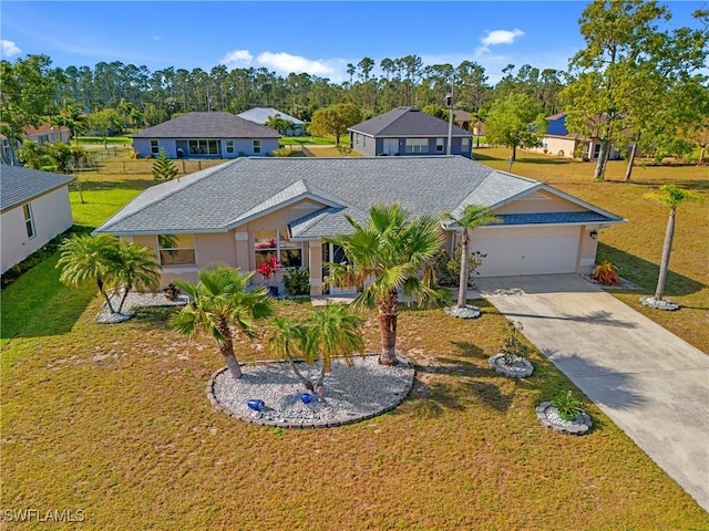 view of front of property with stucco siding, a garage, a residential view, a front lawn, and concrete driveway