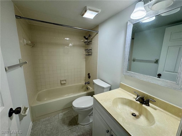bathroom with toilet, tile patterned flooring, bathtub / shower combination, and vanity