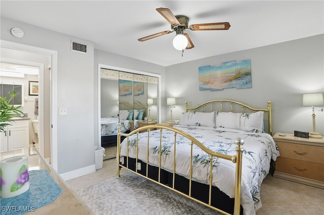 4321 Country Club Blvd Unit 102, Cape Coral, FL 33904 - bedroom with light tile patterned floors and ceiling fan
