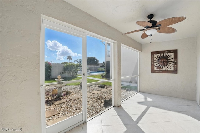 4321 Country Club Blvd Unit 102, Cape Coral, FL 33904 - sunroom / solarium featuring a ceiling fan