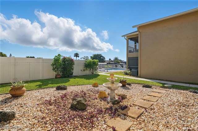 4321 Country Club Blvd Unit 102, Cape Coral, FL 33904 - view of yard with a balcony and a patio