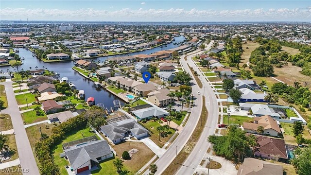 4321 Country Club Blvd Unit 102, Cape Coral, FL 33904 - aerial perspective of suburban area with a nearby body of water