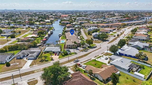 4321 Country Club Blvd Unit 102, Cape Coral, FL 33904 - aerial perspective of suburban area with a large body of water