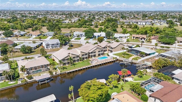 4321 Country Club Blvd Unit 102, Cape Coral, FL 33904 - aerial view of residential area with a nearby body of water