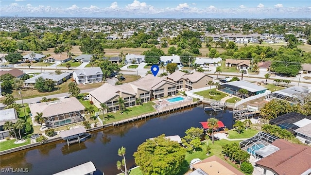 4321 Country Club Blvd Unit 102, Cape Coral, FL 33904 - aerial view of residential area featuring a large body of water