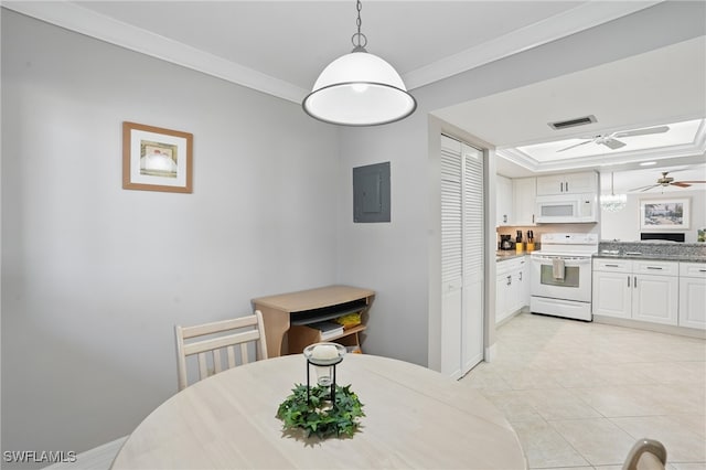 4321 Country Club Blvd Unit 102, Cape Coral, FL 33904 - dining space with crown molding, electric panel, ceiling fan, light tile patterned floors, and a raised ceiling