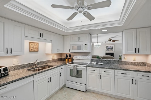4321 Country Club Blvd Unit 102, Cape Coral, FL 33904 - kitchen featuring white appliances, a sink, a tray ceiling, a ceiling fan, and ornamental molding