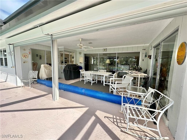 4343 S Gulf Cir, North Fort Myers, FL 33903 - view of patio with a ceiling fan and outdoor dining space