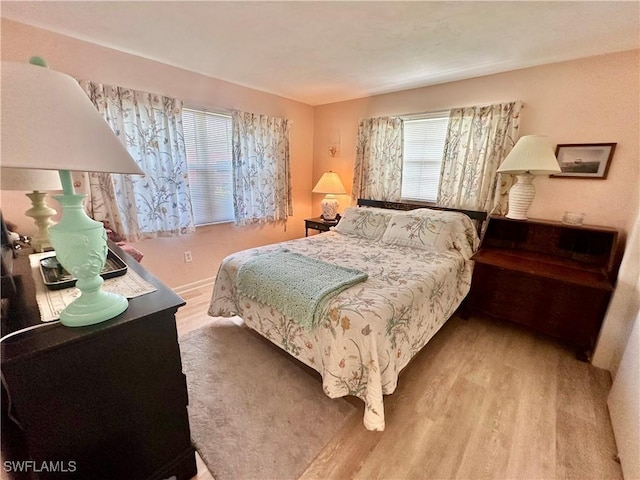 4343 S Gulf Cir, North Fort Myers, FL 33903 - bedroom with wood finished floors