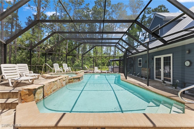 4925 Boxwood Way, Naples, FL 34116 - view of swimming pool featuring a pool with connected hot tub, a patio, and a lanai