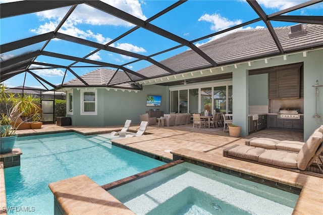 6348 Lyford Isle Dr, Naples, FL 34113 - view of swimming pool featuring a patio, a pool with connected hot tub, glass enclosure, and ceiling fan