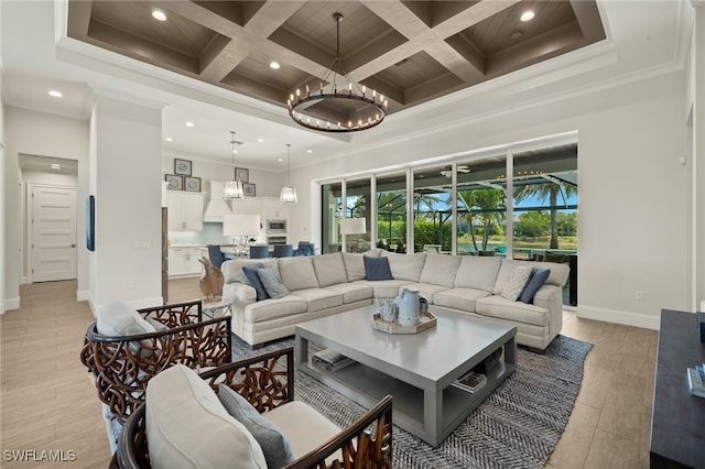 living area with recessed lighting, crown molding, baseboards, and coffered ceiling