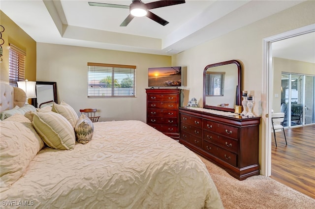 4105 SW 9th Ave, Cape Coral, FL 33914 - carpeted bedroom with a raised ceiling and ceiling fan