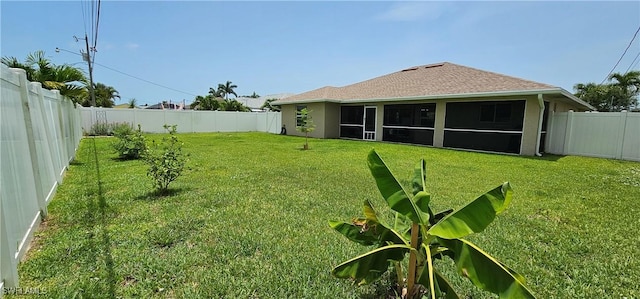 4105 SW 9th Ave, Cape Coral, FL 33914 - fenced backyard with a sunroom