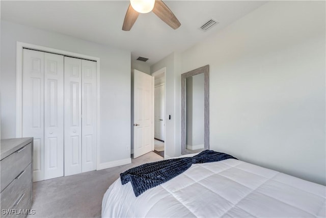 19128 Elston Way, Estero, FL 33928 - bedroom featuring light carpet, a closet, a ceiling fan, and baseboards