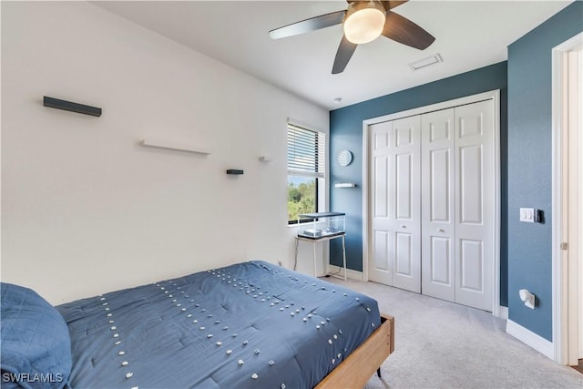 19128 Elston Way, Estero, FL 33928 - carpeted bedroom with baseboards, a closet, and a ceiling fan