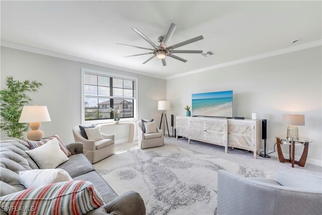 19128 Elston Way, Estero, FL 33928 - living room with ceiling fan, crown molding, carpet, and baseboards