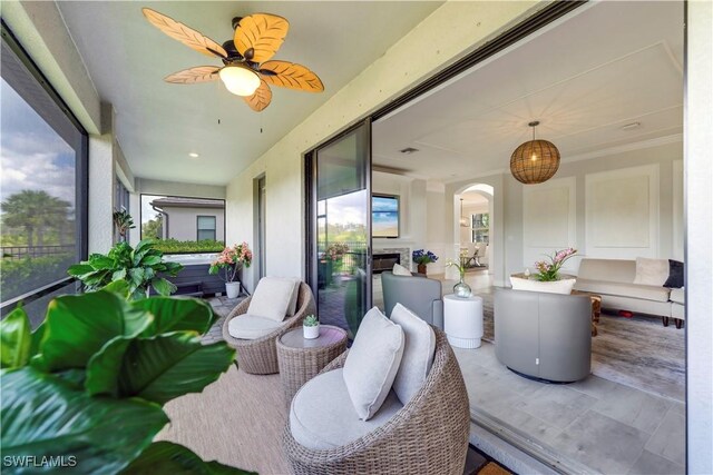 19128 Elston Way, Estero, FL 33928 - sunroom / solarium featuring arched walkways