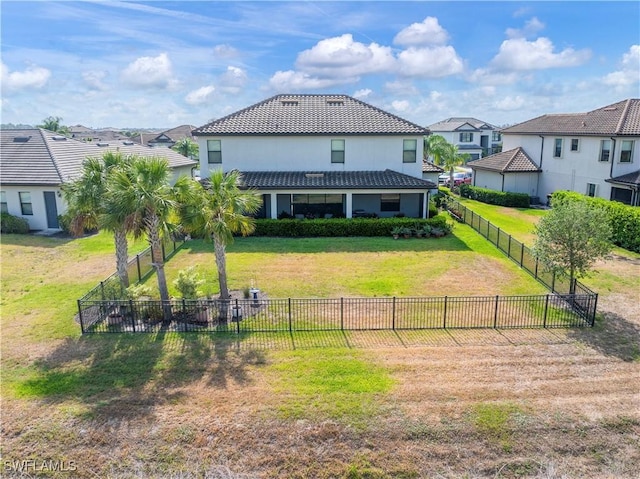 19128 Elston Way, Estero, FL 33928 - back of property featuring a residential view, stucco siding, and a tiled roof