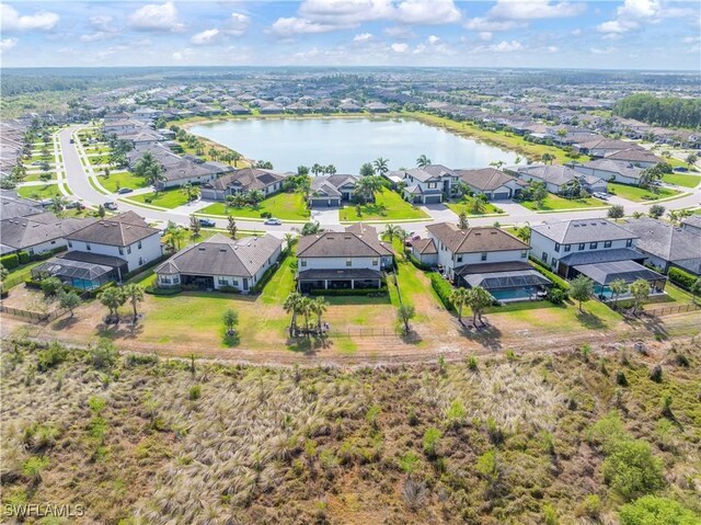 19128 Elston Way, Estero, FL 33928 - aerial view of residential area featuring a large body of water