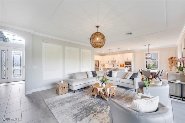 19128 Elston Way, Estero, FL 33928 - living room with ornamental molding and baseboards