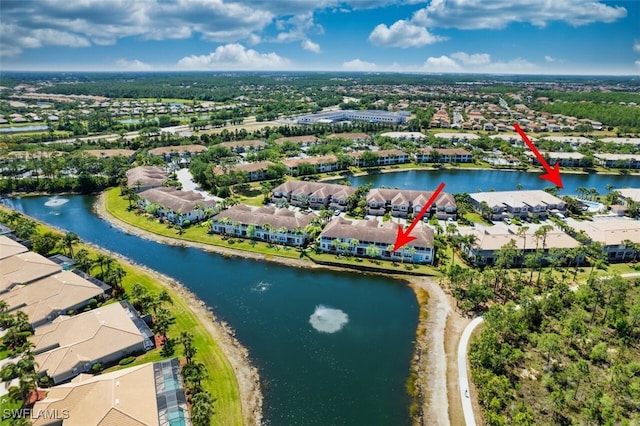 11029 Mill Creek Way Unit 406, Fort Myers, FL 33913 - aerial perspective of suburban area with a large body of water