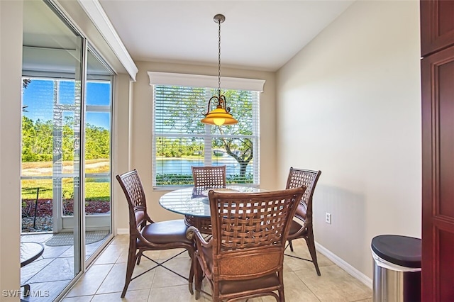 11029 Mill Creek Way Unit 406, Fort Myers, FL 33913 - dining space featuring light tile patterned floors and vaulted ceiling