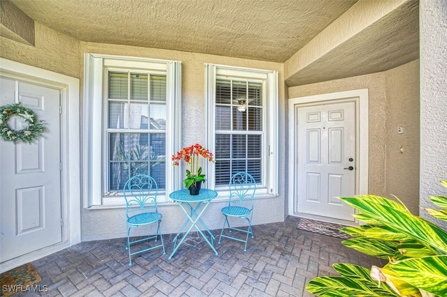 11029 Mill Creek Way Unit 406, Fort Myers, FL 33913 - entrance to property with stucco siding and a porch