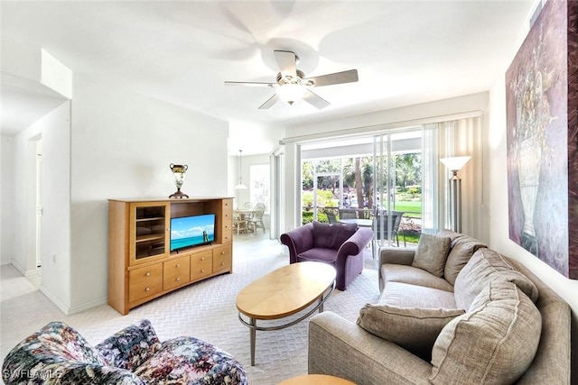 2190 Arielle Dr Unit 903, Naples, FL 34109 - living area featuring carpet flooring, baseboards, and ceiling fan