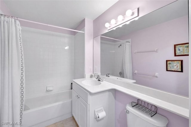 2190 Arielle Dr Unit 903, Naples, FL 34109 - bathroom featuring shower / bath combination with curtain, toilet, vanity, and tile patterned floors