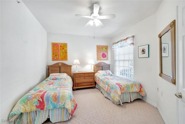 2190 Arielle Dr Unit 903, Naples, FL 34109 - bedroom featuring light carpet and a ceiling fan