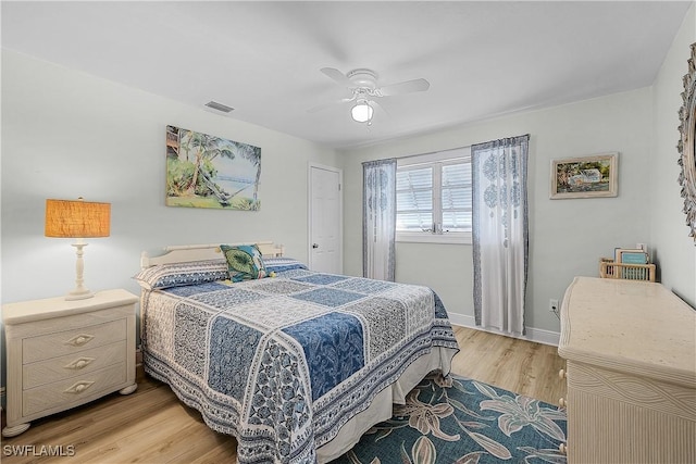 3797 Emerald Ave, Saint James City, FL 33956 - bedroom with light wood-type flooring, visible vents, a ceiling fan, and baseboards