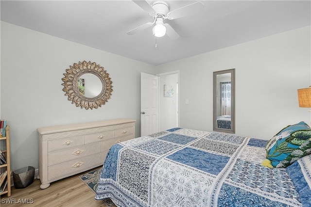 3797 Emerald Ave, Saint James City, FL 33956 - bedroom with light wood-type flooring and ceiling fan