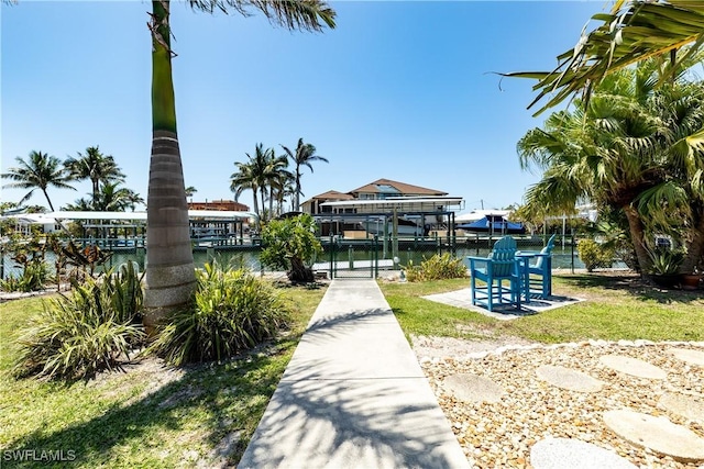 3797 Emerald Ave, Saint James City, FL 33956 - surrounding community featuring a gate, a water view, a boat dock, and boat lift