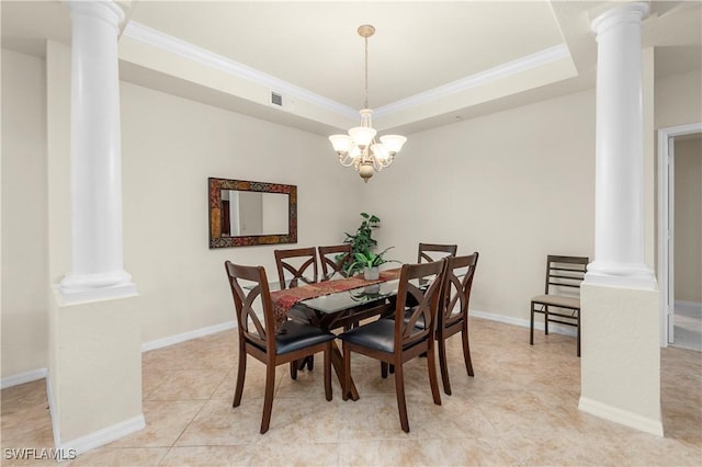 dining room with crown molding, light tile patterned flooring, a tray ceiling, and ornate columns