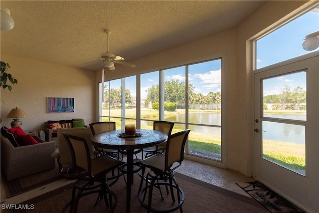 sunroom with a water view