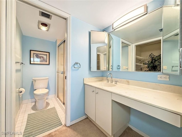 1632 Spoonbill Ln Unit B, Naples, FL 34105 - bathroom featuring toilet, vanity, a shower stall, and baseboards