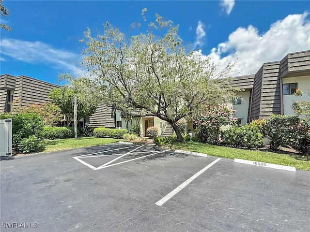 1632 Spoonbill Ln Unit B, Naples, FL 34105 - view of uncovered parking lot