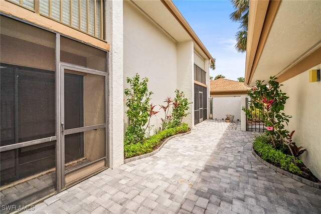 517 Lake Louise Cir Unit 101, Naples, FL 34110 - view of patio / terrace