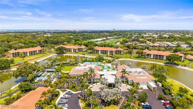 517 Lake Louise Cir Unit 101, Naples, FL 34110 - aerial view of a large body of water