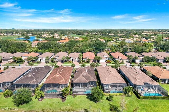 aerial view featuring a water view and a residential view
