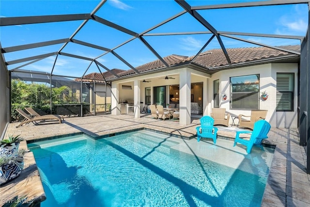 23737 Pebble Pointe Ln, Estero, FL 34135 - back of property featuring a patio area, a ceiling fan, a tile roof, and stucco siding