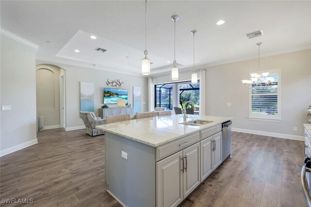 kitchen with visible vents, a sink, dishwasher, and dark wood-style floors