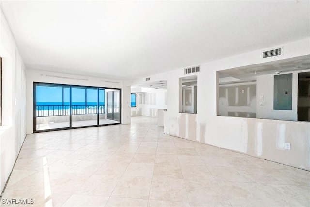 26130 Hickory Blvd Unit 1B, Bonita Springs, FL 34134 - tiled spare room with electric panel