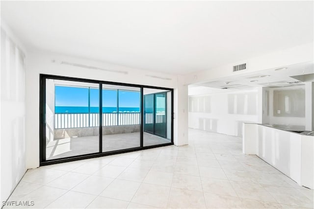 26130 Hickory Blvd Unit 1B, Bonita Springs, FL 34134 - spare room with light tile patterned floors