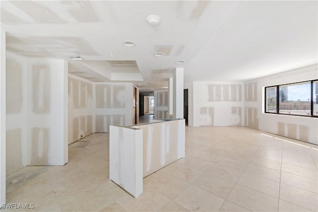 26130 Hickory Blvd Unit 1B, Bonita Springs, FL 34134 - kitchen with open floor plan and light tile patterned flooring