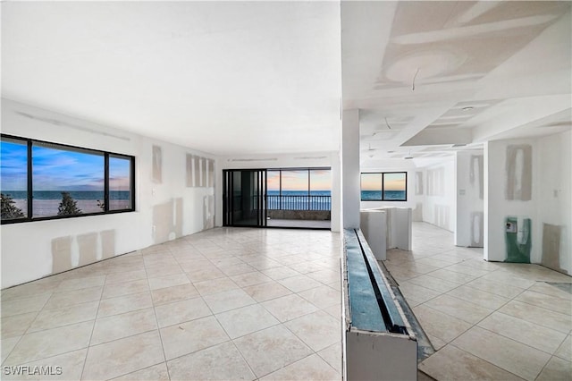 26130 Hickory Blvd Unit 1B, Bonita Springs, FL 34134 - unfurnished room with light tile patterned flooring