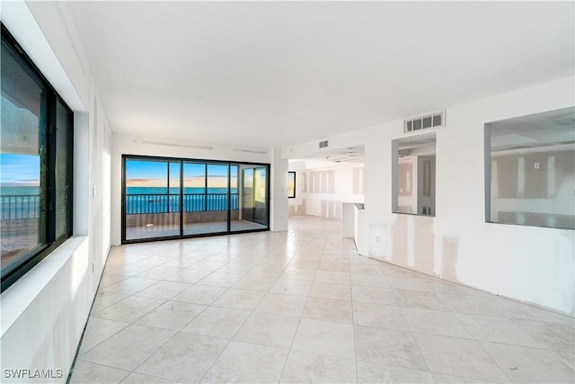 26130 Hickory Blvd Unit 1B, Bonita Springs, FL 34134 - spare room featuring light tile patterned floors