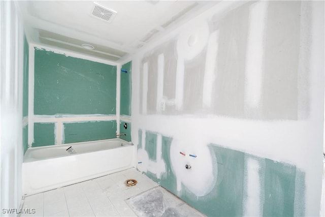 26130 Hickory Blvd Unit 1B, Bonita Springs, FL 34134 - bathroom with a bath and tile patterned flooring