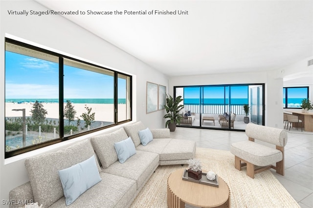 26130 Hickory Blvd Unit 1B, Bonita Springs, FL 34134 - tiled living room featuring a water view